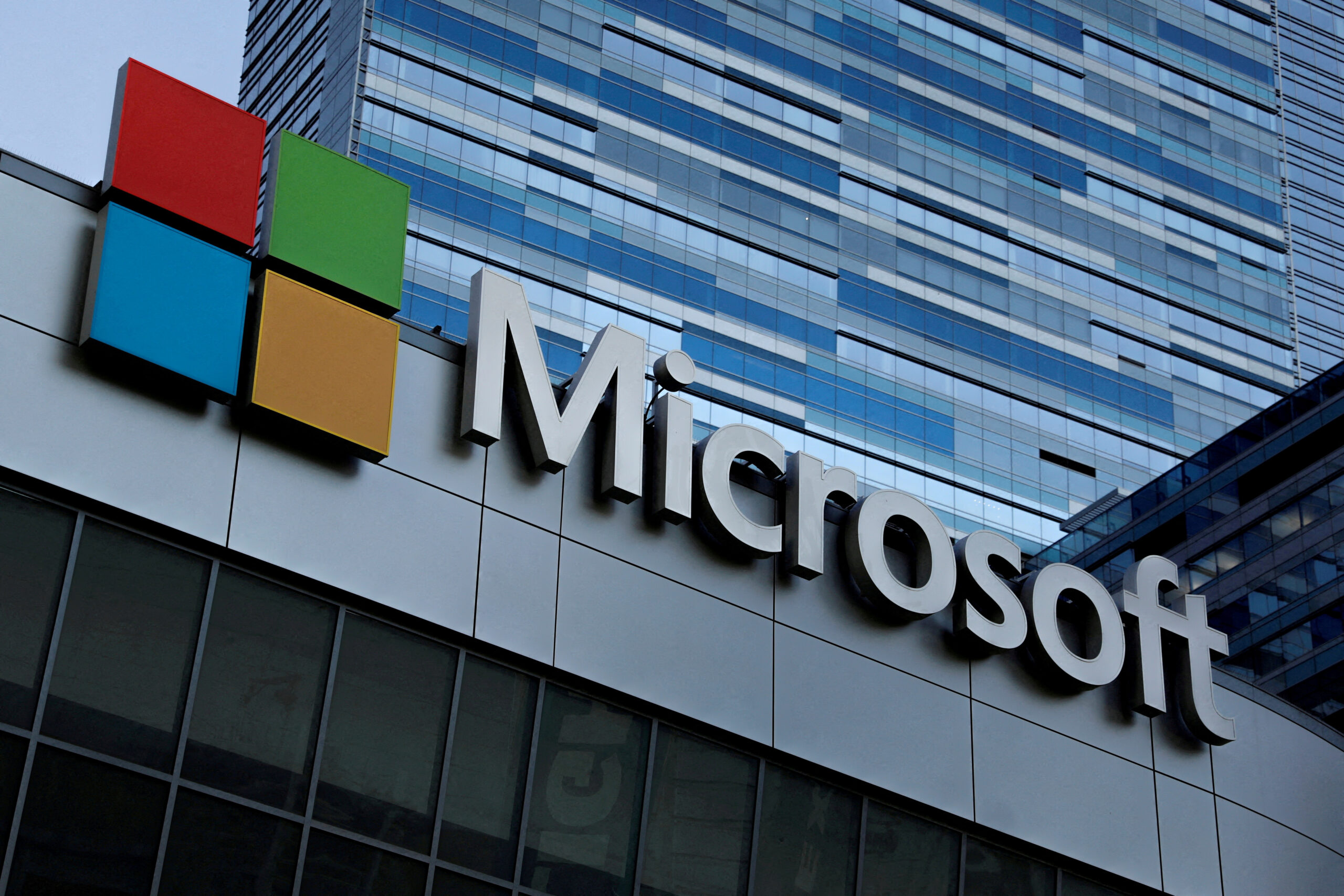 FILE PHOTO: The Microsoft sign is shown on top of the Microsoft Theatre in Los Angeles, California, U.S. October 19, 2018.  REUTERS/Mike Blake/File Photo