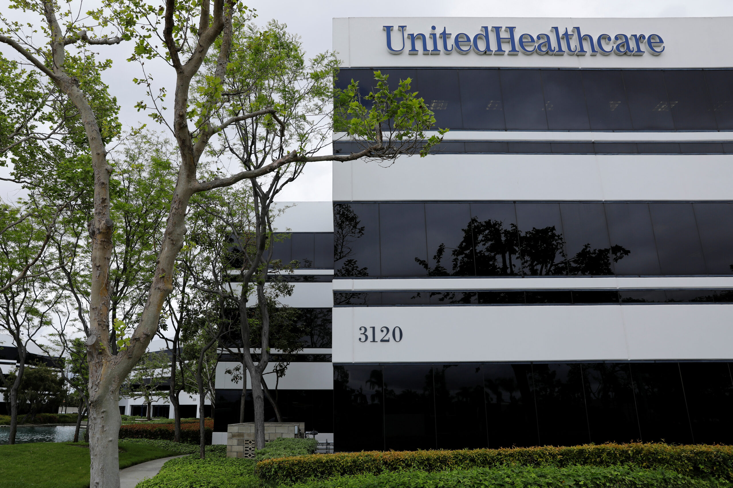 The corporate logo of the UnitedHealth Group appears on the side of one of their office buildings in Santa Ana, California, U.S., April 13, 2020.      REUTERS/Mike Blake