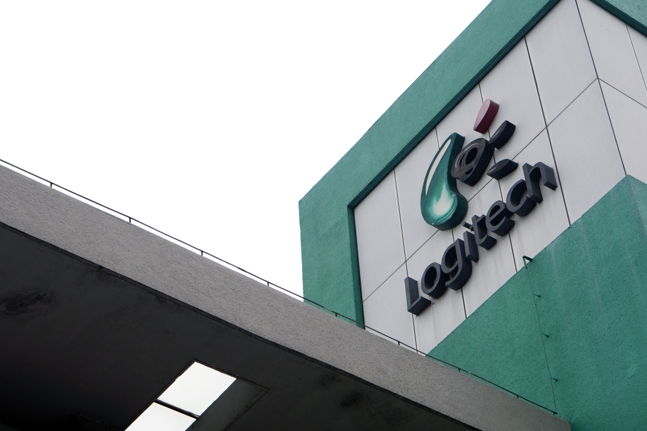 Logitech International SA signage is displayed outside the company's factory in Suzhou, Jiangsu Province, China, on Friday, March 2, 2012. Logitech is the world's biggest maker of computer mice. Photographer: Nelson Ching/Bloomberg