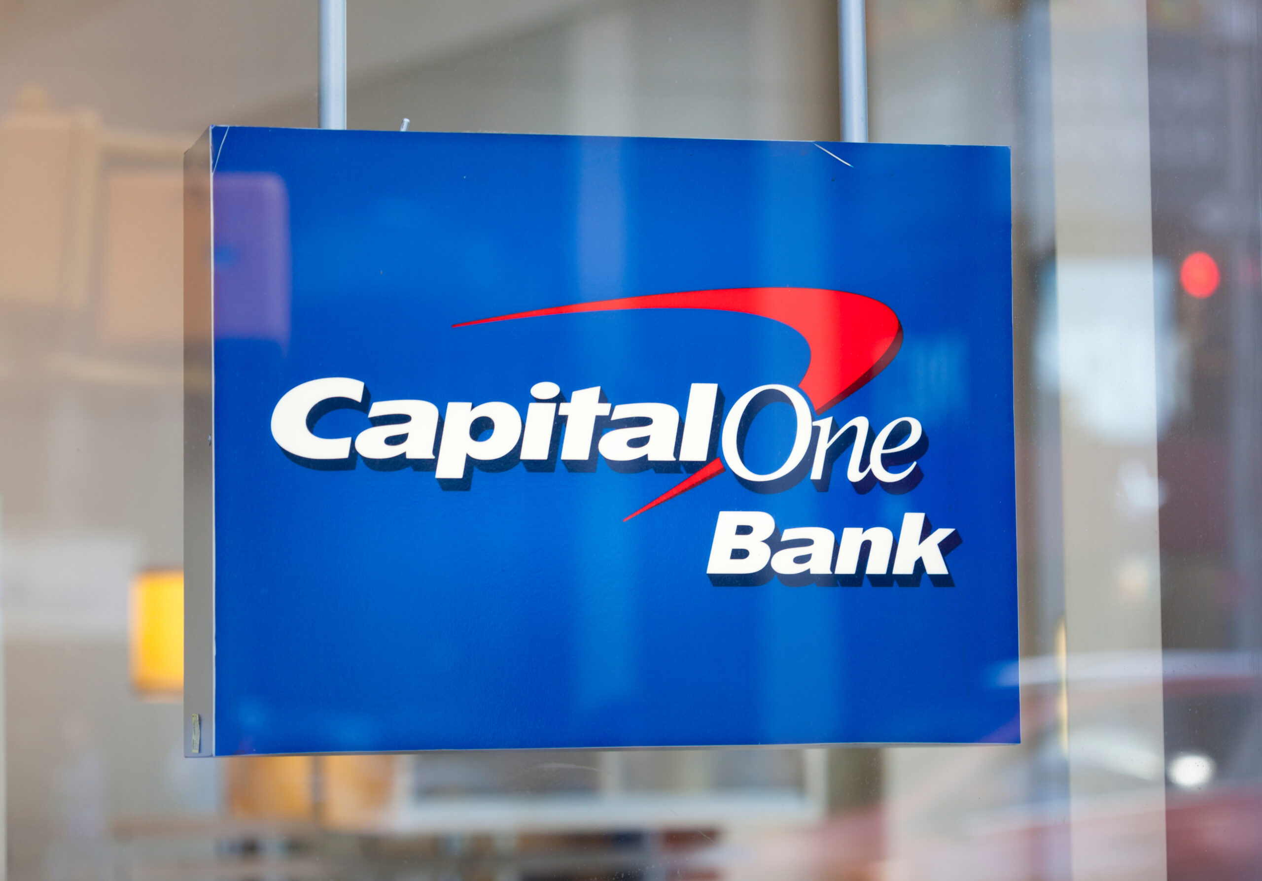 New York, New York, USA - October 10, 2019: Capital One Bank sign in a window.
