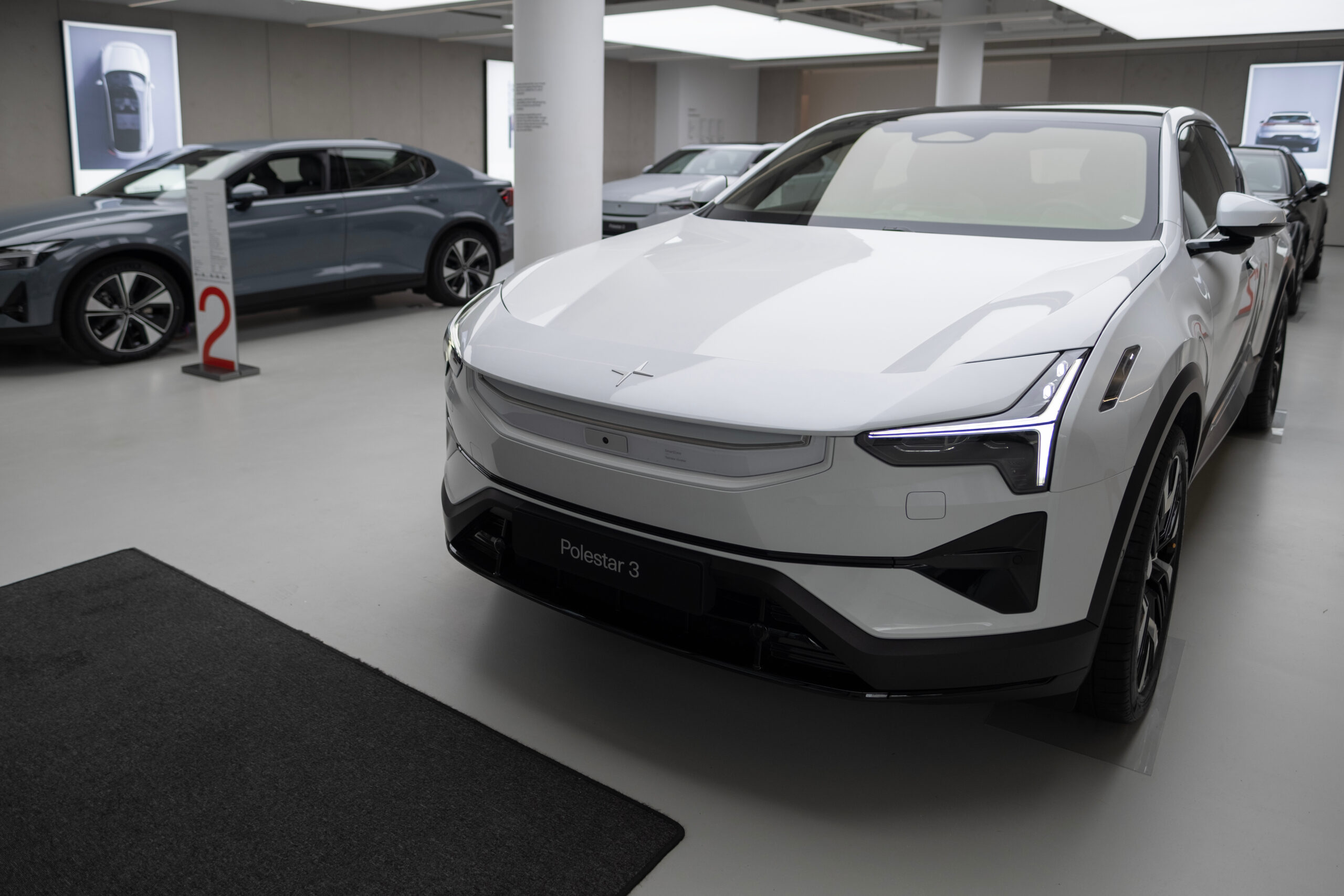 Polestar 2 car model in Studio, Volvo’s EV subsidiary, grey electric passenger vehicle in exhibition hall, alternative energy development, High Tech Technology, Stuttgart, Germany - December 16, 2024