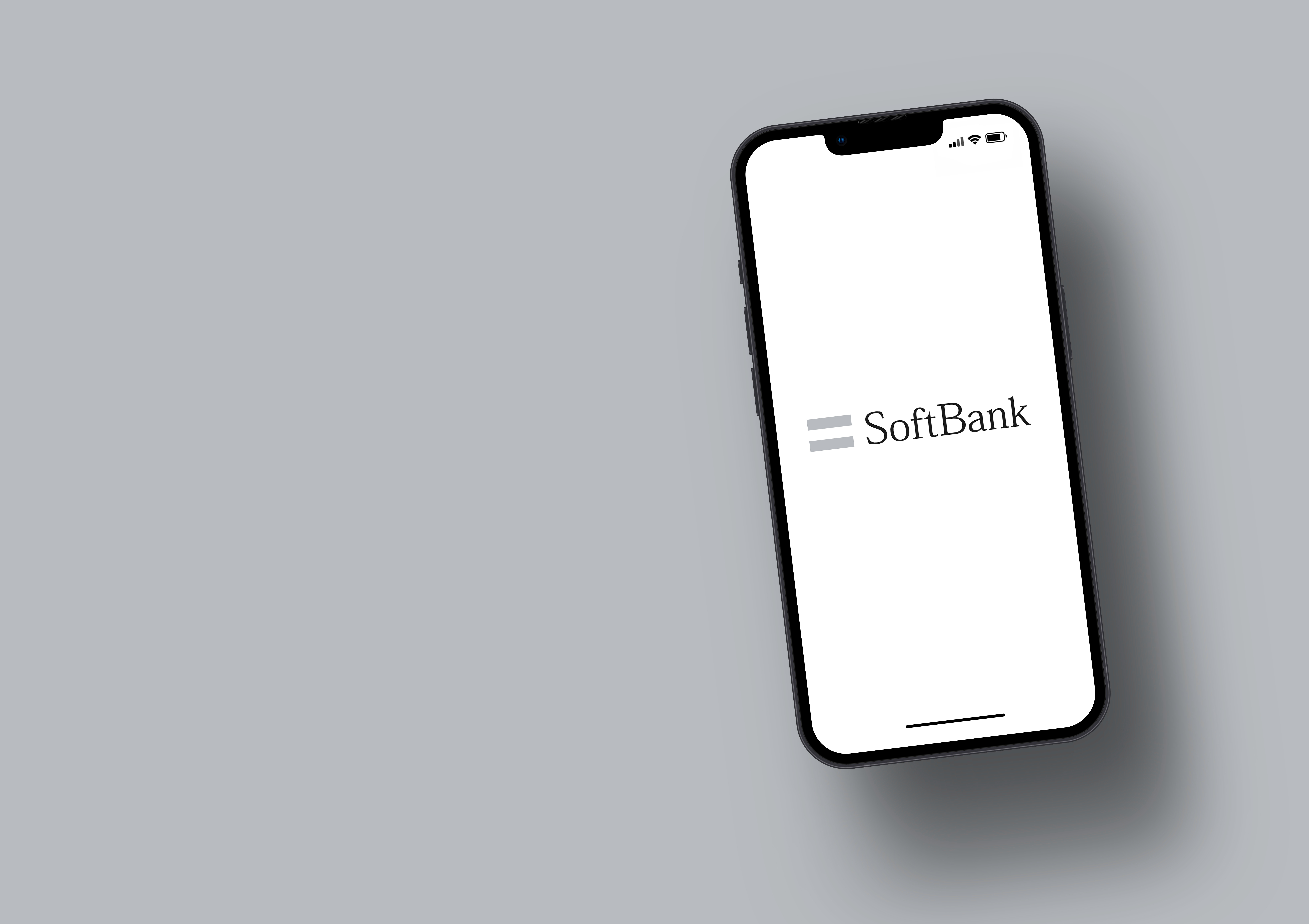 SoftBank bank app on smartphone screen with large shadow giving the feeling of floating on top of the background. Gray background. Rio de Janeiro, RJ, Brazil. March 2022