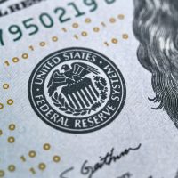 macro photo of federal reserve system symbol on hundred dollar bill. shallow focus. close-up with fine and sharp texture
