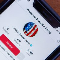 Vancouver, CANADA - Jun 10 2024 : President Donald J Trump TikTok account (@realdonaldtrump) seen in an iPhone screen.